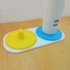 two person electric toothbrush holder for oral-b toothbrushes yellow & blue