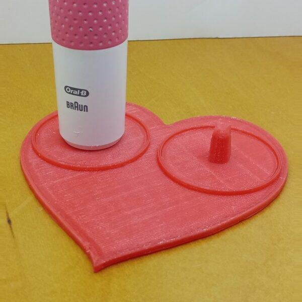 Red couples heart shaped toothbrush holders