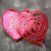 Heart shaped box with rose filigree of various sizes red