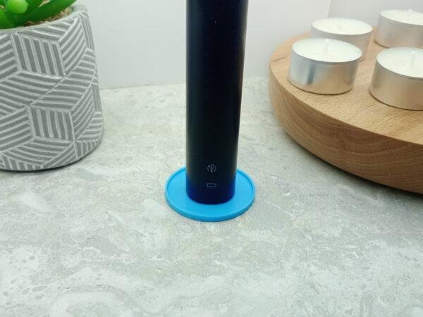 White Philips Sonicare toothbrush holder